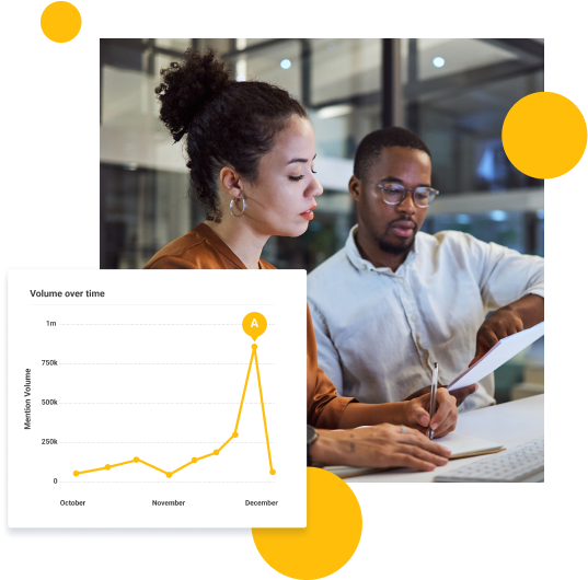 Man and woman looking at a piece of paper.The man Is pointing to something on the page.